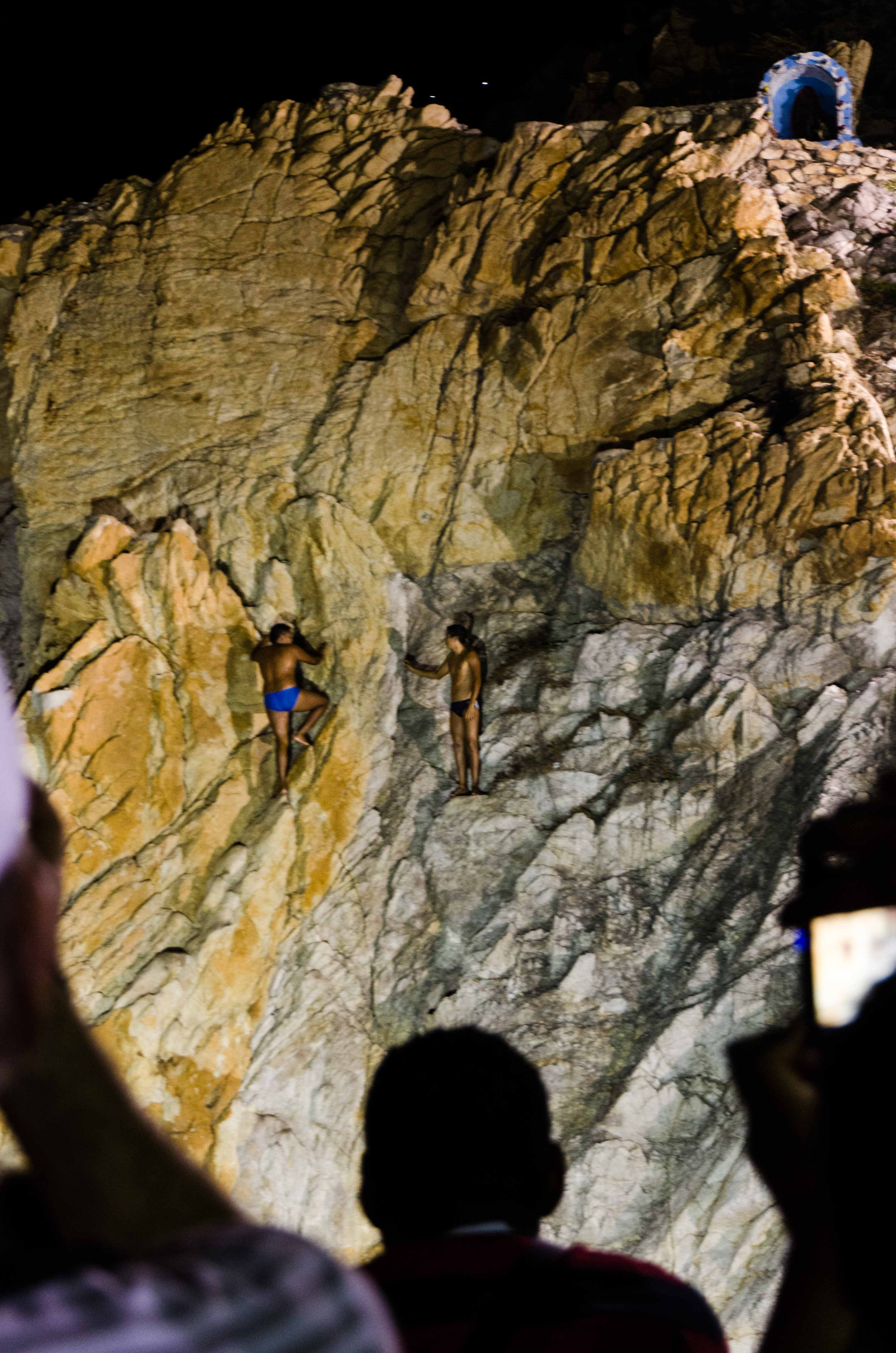 The Famous Clavadistas of Acapulco, climbing 30 meters up a cliff face